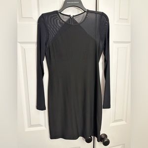 Above the knee black tight dress with mesh sleeves